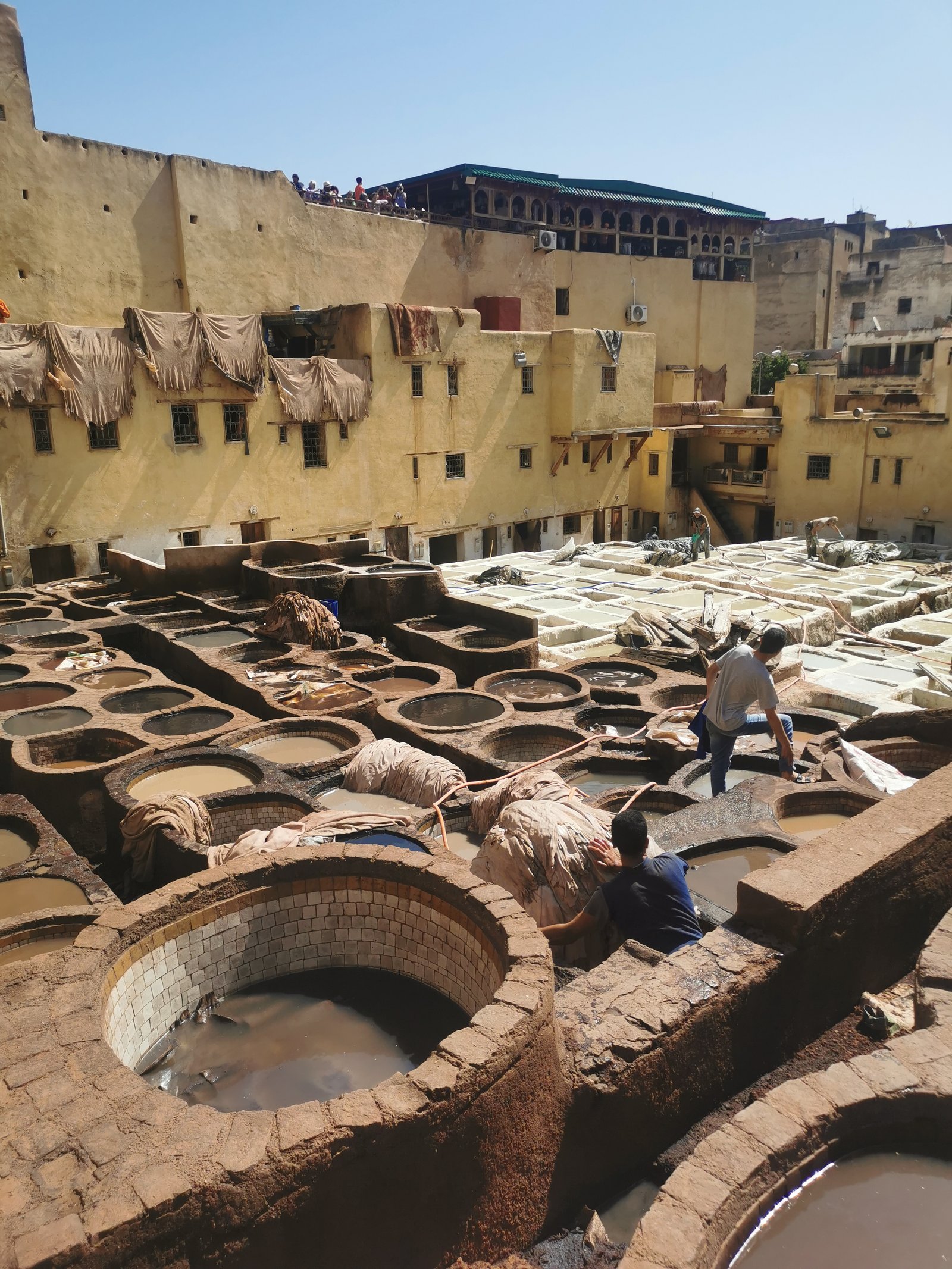 Moroccan street scene with warm light and traditional details.